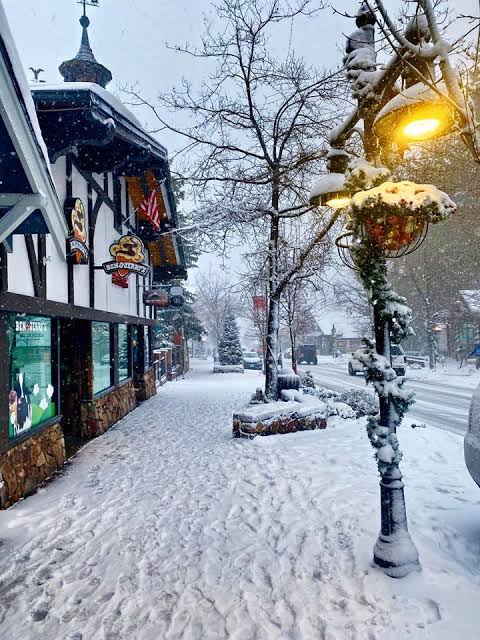 Snow-covered Big Bear Village during the holiday season near Edgar’s Hideaway vacation rental
