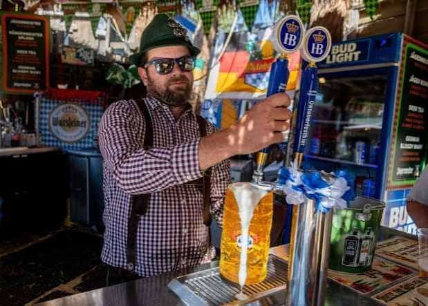 Big Bear Lake Oktoberfest 2026: A Fall Tradition We’ve Loved for Nearly 20 Years 2 German beer being served at Big Bear Lake Oktoberfest